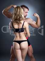 Sexy girls loves bodybuilders. Photo concept