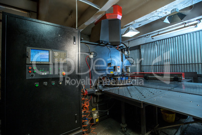 Production department. Machine for punching metal