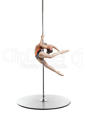 Sexy dancer spinning gracefully on pylon