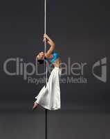 Concept of strength and beauty. Sexual pole dance