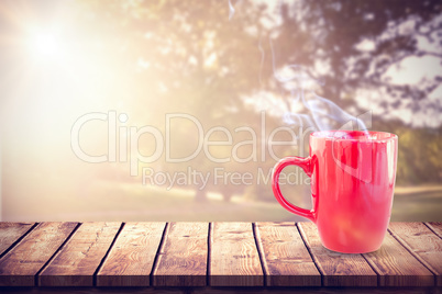 Composite image of red mug on white background