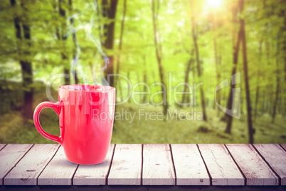 Composite image of red mug on white background