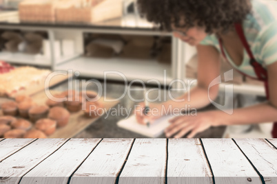 Composite image of wooden table