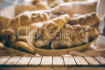 Composite image of wooden desk