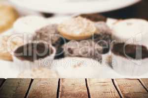 Composite image of wooden desk