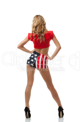 Rear view of model in blouse and patriotic shorts