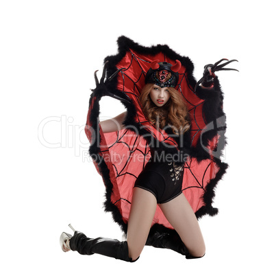 Halloween. Beautiful girl posing as Spider Queen