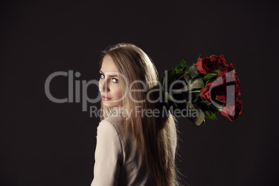 Sexy model threw rose bouquet over her shoulder