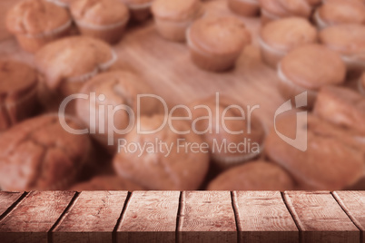 Composite image of wooden desk