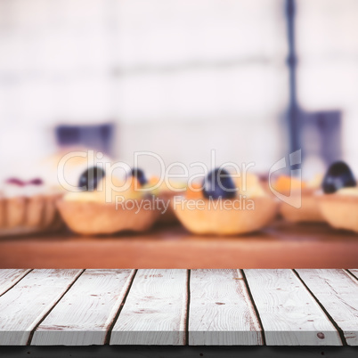 Composite image of wooden table Composite image of wooden table