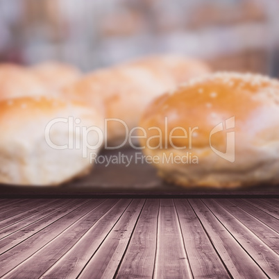 Composite image of high angle view of gray hardwood floor