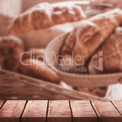 Composite image of wooden desk