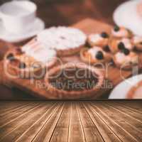 Composite image of high angle view of gray hardwood floor