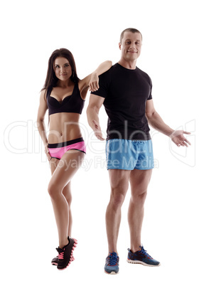 Sport. Attractive man and woman posing in studio