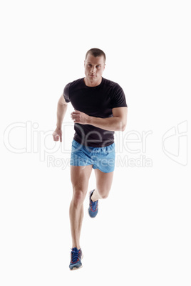 Handsome sportsman runs. Isolated on white