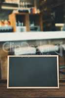 Composite image of square bar stools at the counter