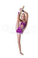 Cute female gymnast posing in vertical split