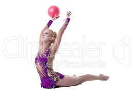 Image of rhythmic gymnast performs with ball
