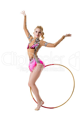 Attractive young gymnast posing with hoop