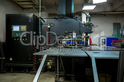 Production workshop. Machine for punching metal