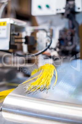 Image of crimped wires on machine