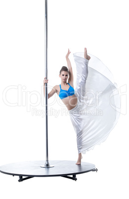 Pole dance. Flexible woman posing at camera