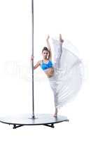 Pole dance. Flexible woman posing at camera