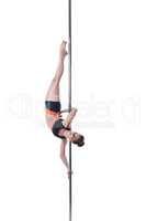 Pretty strong girl posing upside down on pylon