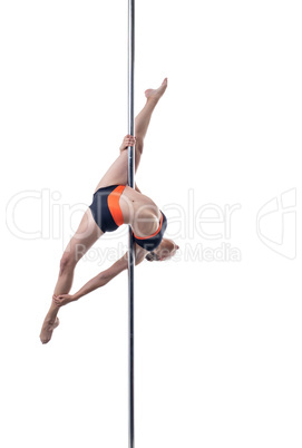 Flexible girl performs difficult element on pylon
