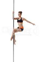 Image of cute dancer exercising on pylon