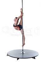 Strength and grace of pole dance. Cute girl posing