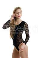 Underwear fashion. Pretty model posing in bodysuit