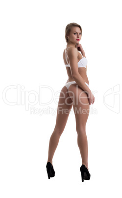 Leggy model in lingerie posing back to camera