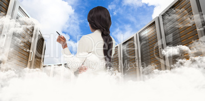 Composite image of thinking businesswoman