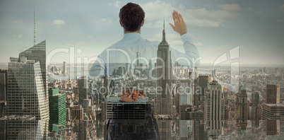 Composite image of businessman crossing fingers behind his back