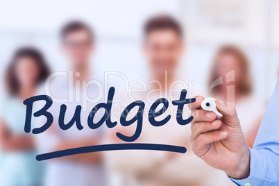 Composite image of concentrated businessman writing with marker