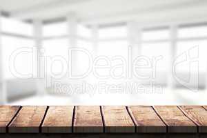 Composite image of wooden desk