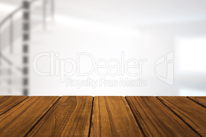 Composite image of high angle view of hardwood floor