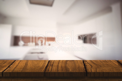 Composite image of wooden desk