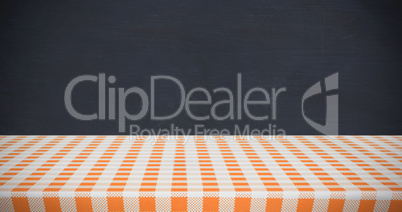 Composite image of orange and white tablecloth