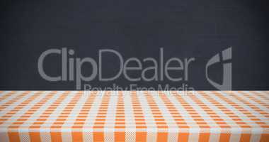 Composite image of orange and white tablecloth