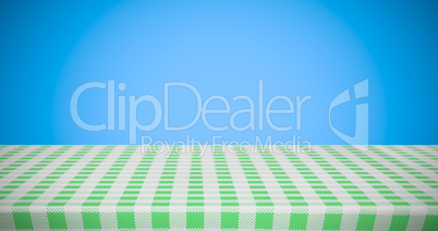 Composite image of white and green tablecloth