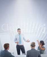 Composite image of business team interacting during brainstormin
