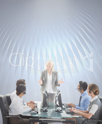 Composite image of smiling business people speaking together