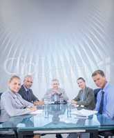 Composite image of business colleagues discussing about work