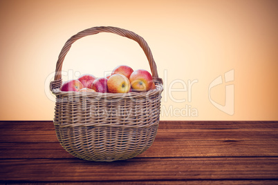 Composite image of basket of apples