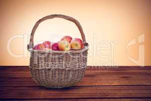 Composite image of basket of apples