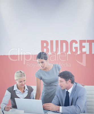 Composite image of business people using laptop