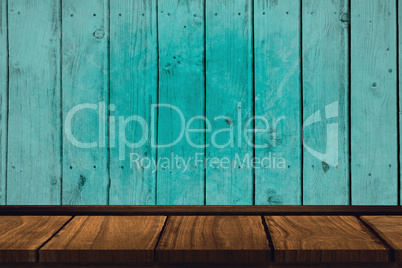 Composite image of wooden desk