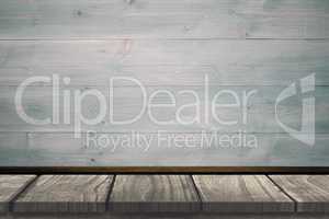 Composite image of wooden desk